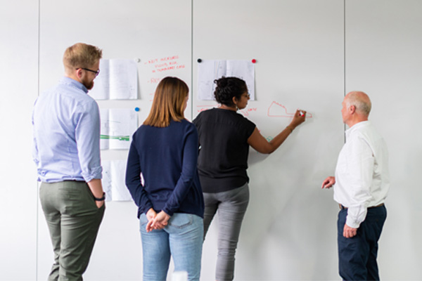 People on white board